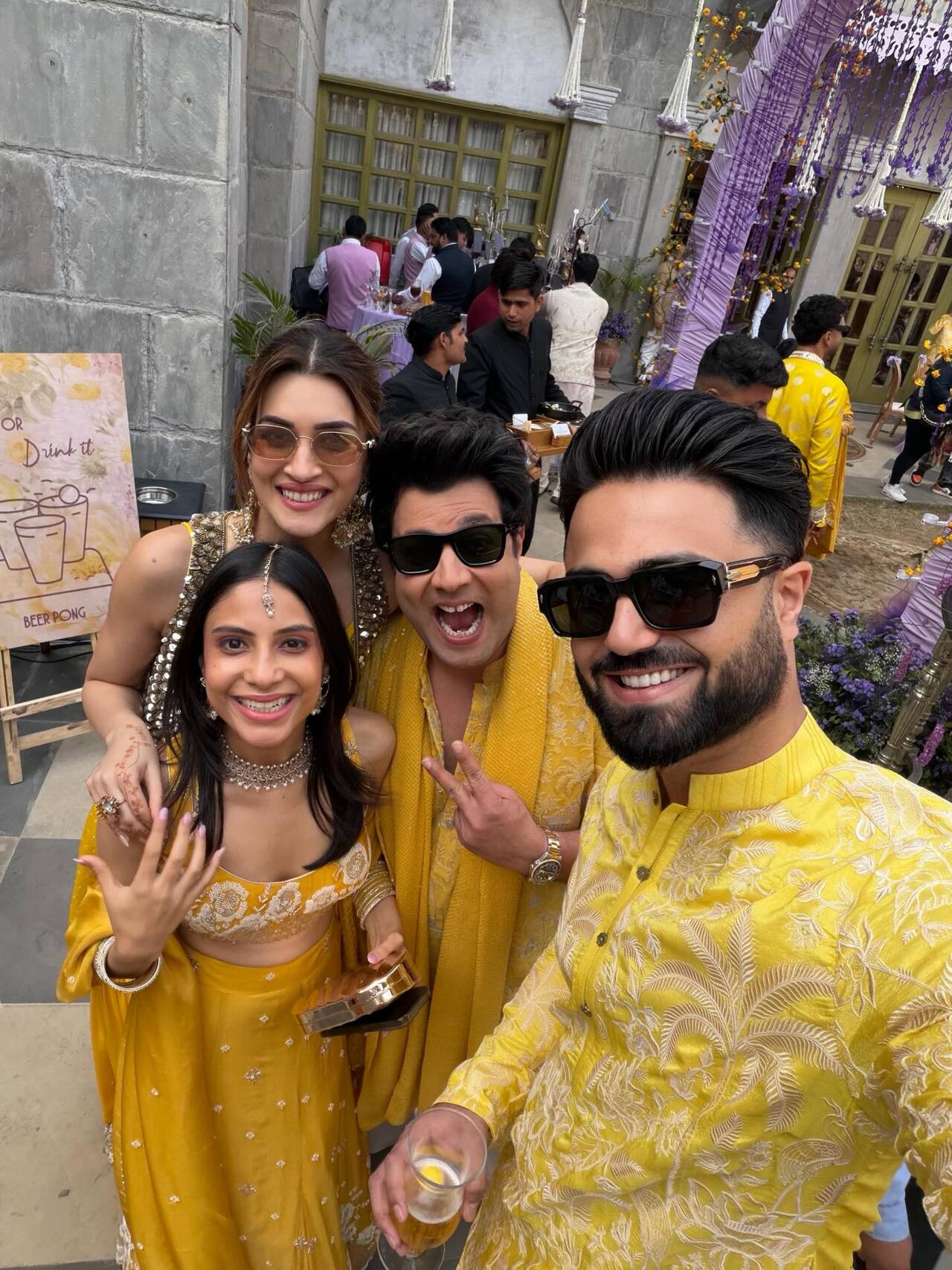Kabir Bahia, Kriti, Varun Sharma and a friend pose for a fun selfie at Nupur and Stebin Ben's haldi ceremony.