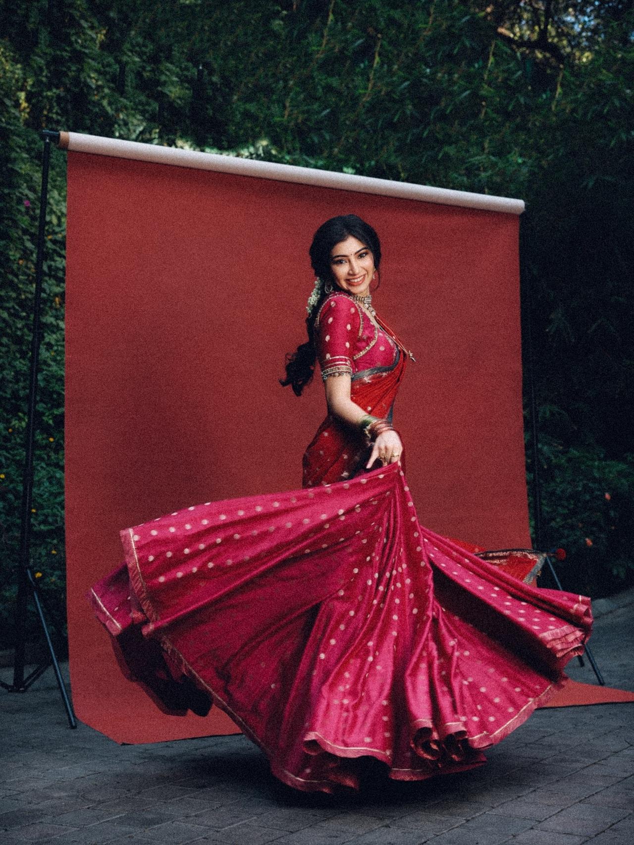 The saree was draped in a skirt style featuring ample flair that looked dreamy as she twirled.