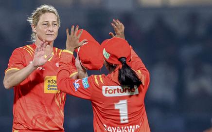 Gujarat Giants' Sophie Devine and Rajeshwari Gayakwad celebrate the wicket of Delhi Capitals' Lizelle Lee during the Women's Premier League (WPL) 2026 T20 cricket match between Gujarat Giants and Delhi Capitals, at BCA Stadium, in Vadodara, Gujarat. Pic/PTI