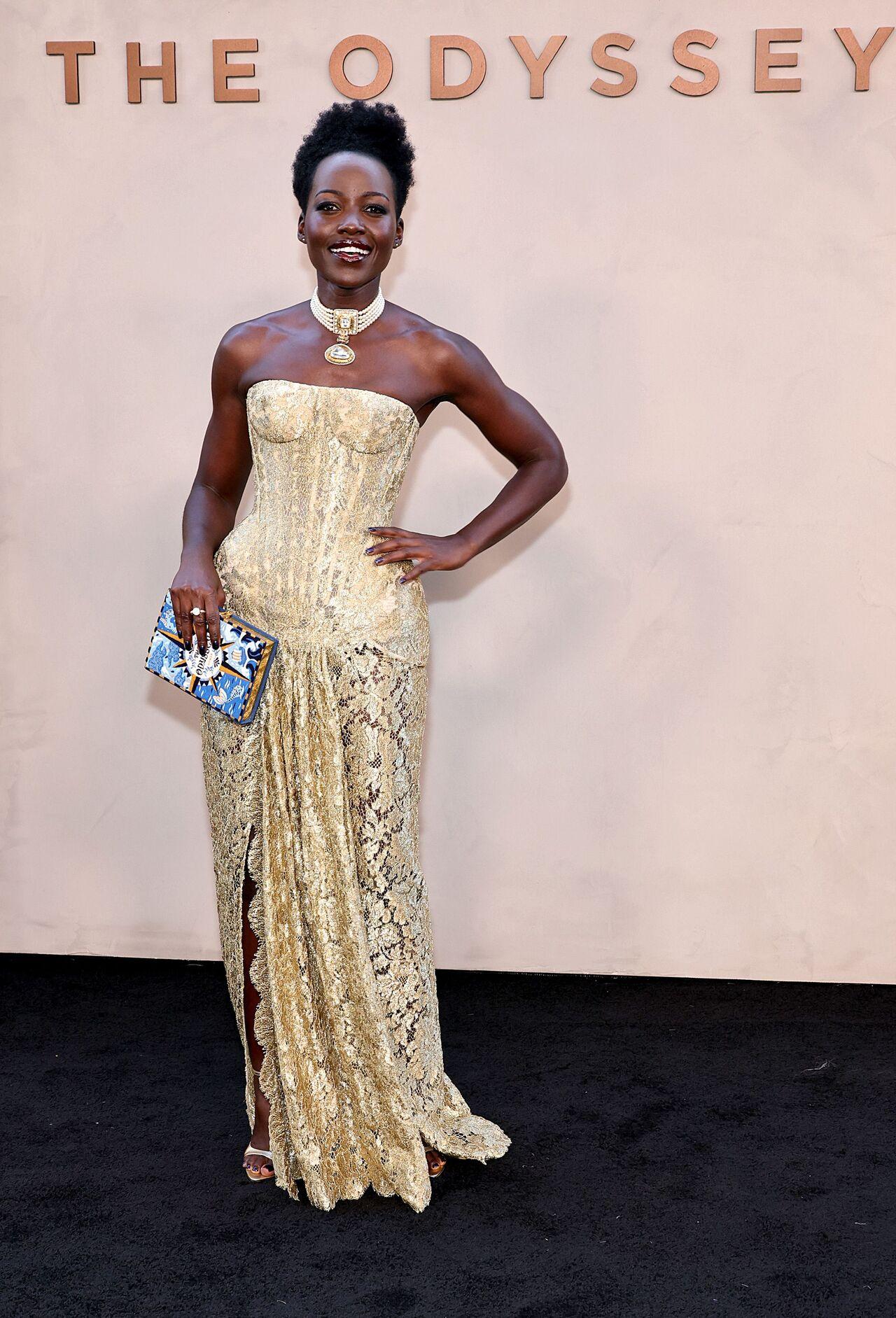 Lupita Nyong&rsquo;o arrived in style to The Odyssey premiere in New York City, wearing a strapless golden dress and a statement multi-strand pearl choker. In the film, Nyong&rsquo;o takes on the dual roles of Helen of Troy and her twin sister, Clytemnestra.