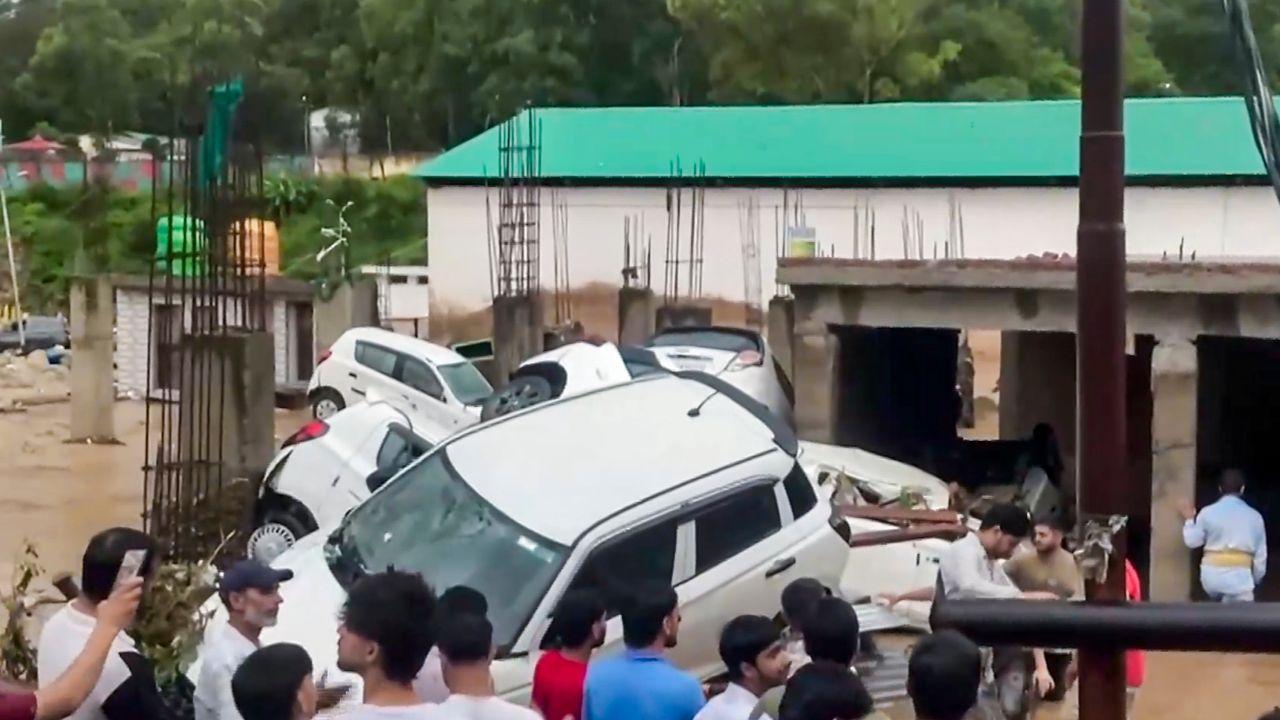 &nbsp;Dozens of vehicles were swept away or submerged after overflowing rivers breached their banks, causing widespread disruption
