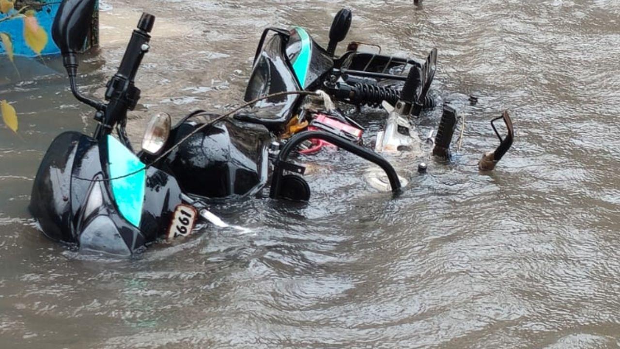 Amid the heavy rains, waterlogged streets created chaos for commuters as several two-wheelers remained partially submerged