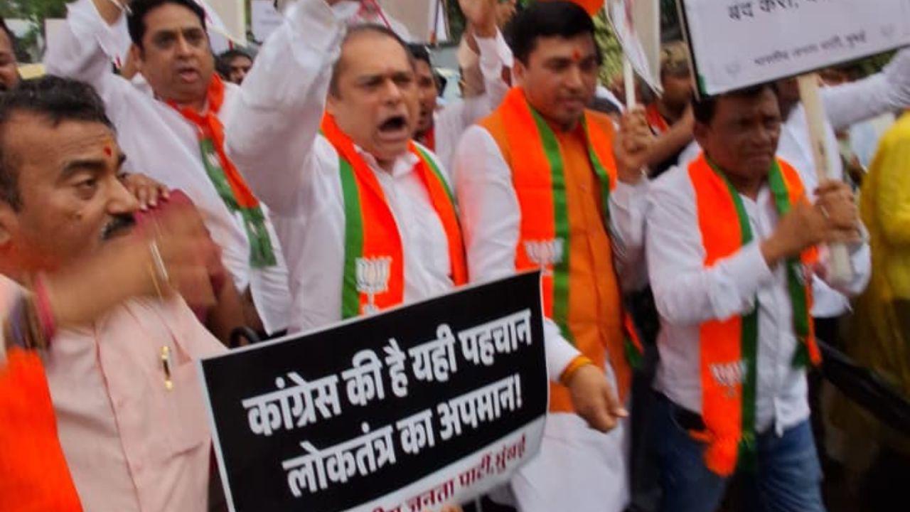 BJP MLA Ameet Satam (centre) leads a protest against Rahul Gandhi in Mumbai on Wednesday. PIC/X