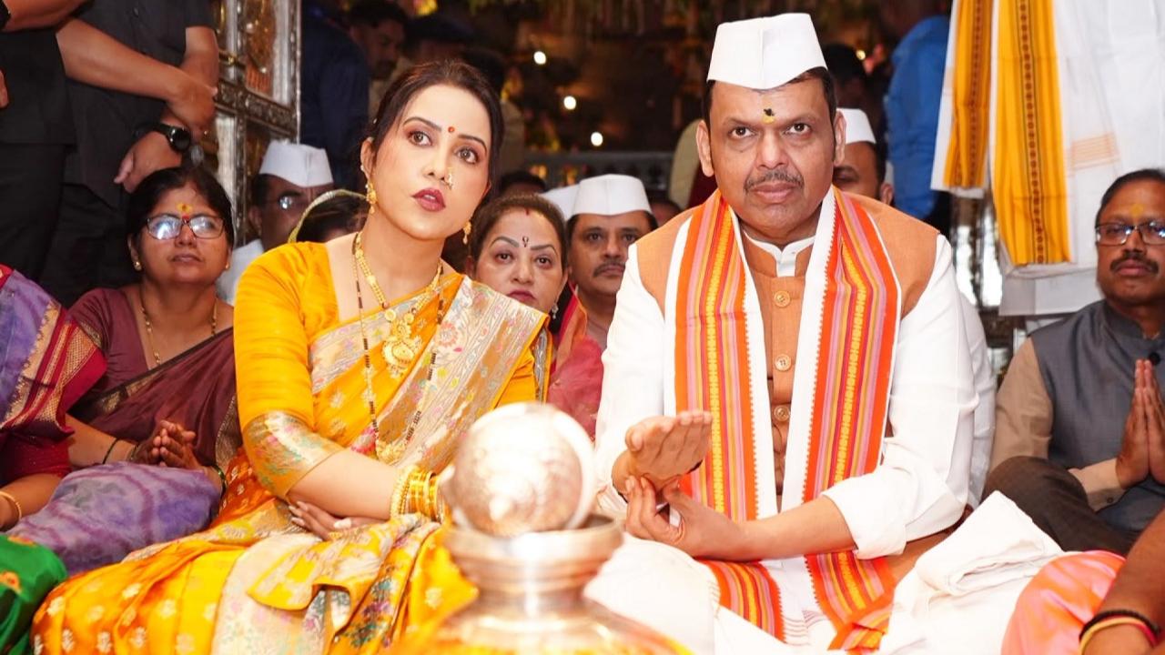 Amruta Fadnavis says she will ensure Devendra Fadnavis stays in Maharashtra Amruta Fadnavis (Left) and Devendra Fadnavis (Right). Pic/X