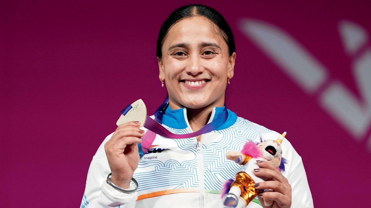Commonwealth Games: Silver hero Harjinder’s mum is unhappy! Harjinder Kaur with her silver medal on Tuesday. Pic/PTI