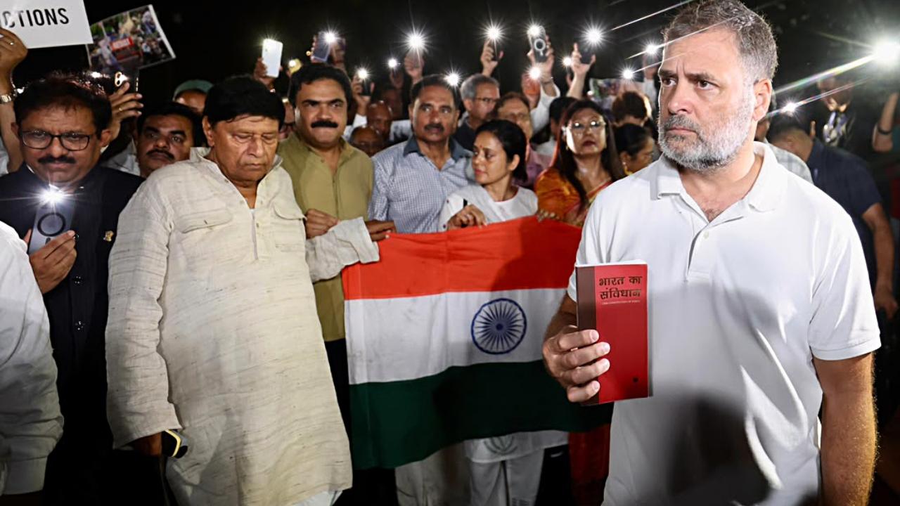 Several opposition MPs switch on the flashlights of their mobile phones as part of the tribute, creating a symbolic moment of remembrance for the departed students.