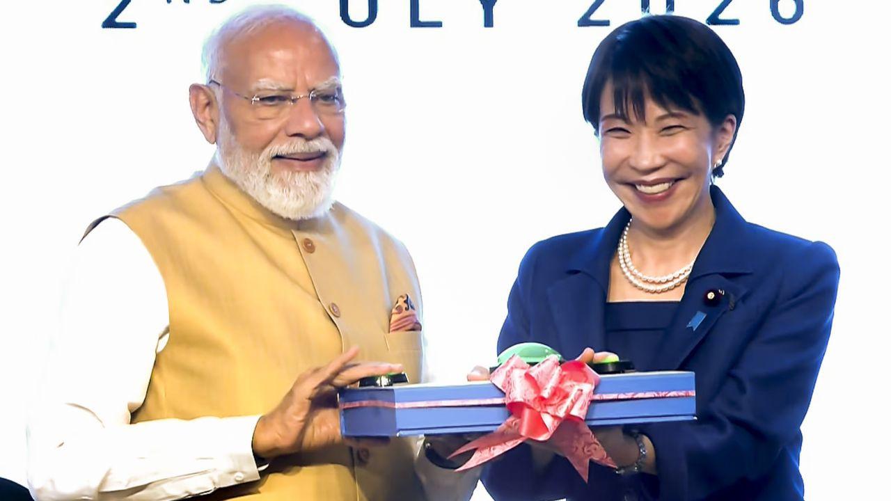Prime Minister Narendra Modi and Japanese Prime Minister Sanae Takaichi jointly press the button during the inauguration of an initiative at the India-Japan Business Forum, in New Delhi. PIC/PTI