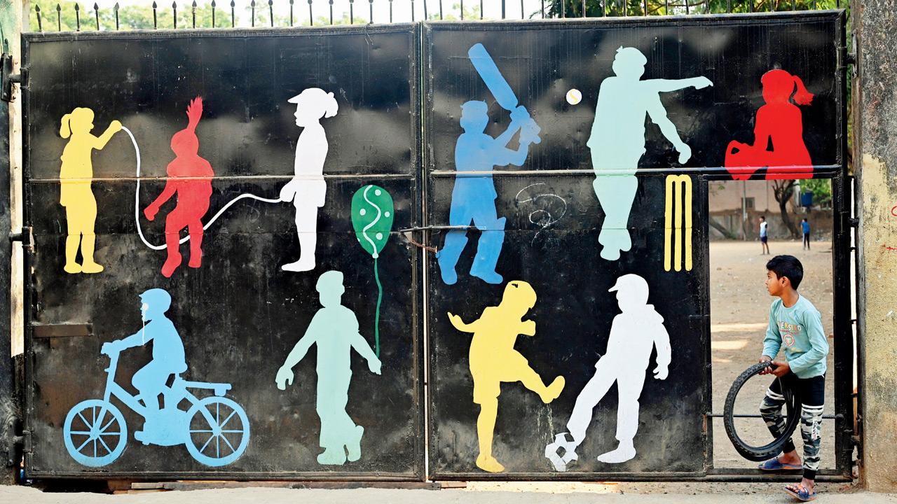 The energy is infectious and this boy silhouetted against a sports billboard in Kandivli knows it. Pic/SATEJ SHINDE The energy is infectious and this boy silhouetted against a sports billboard in Kandivli knows it. Pic/SATEJ SHINDE