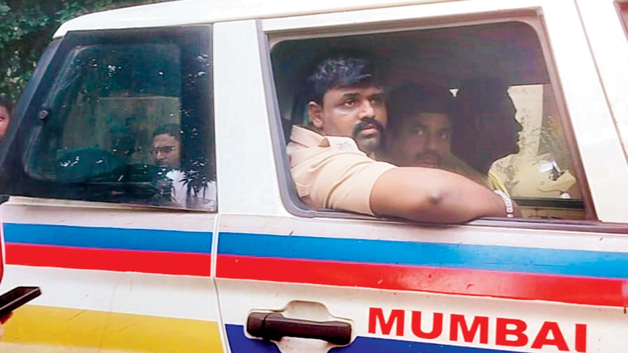 The accused being taken to court in a police jeep. Pic/By Special Arrangement