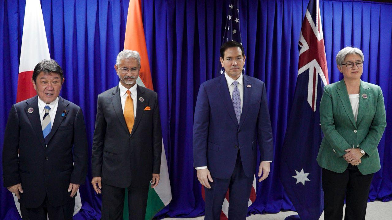 Japan's Foreign Minister Takeshi Iwaya, External Affairs Minister S. Jaishankar, US Secretary of State Marco Rubio and Australian Foreign Minister Penny Wong pose for a group photograph in Manila