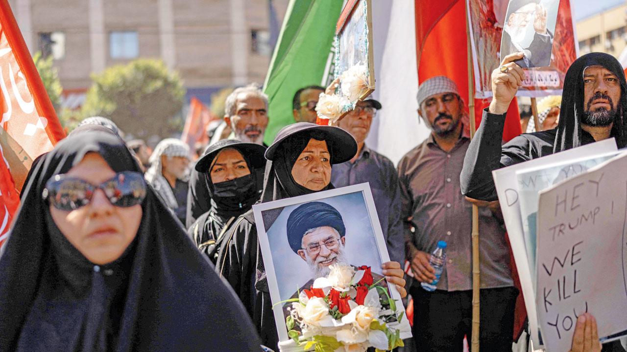 Mourners attend the funeral of Iran’s slain supreme leader Ali Khamenei and members of his family, in Mashhad, on Thursday. Pic/AFP