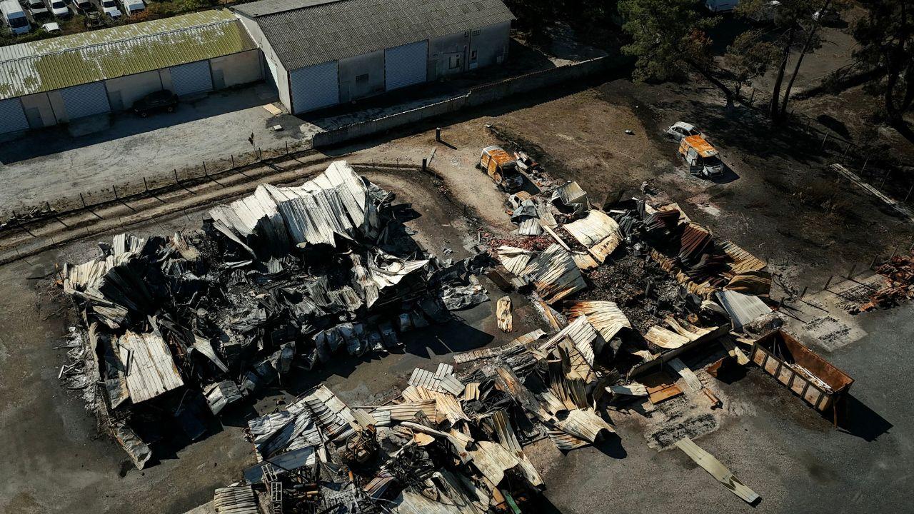 Burnt premises and vehicles destroyed by a wildfire in a business park in Biscarrosse, southwestern France. Over the past six days, the wildfire near Bordeaux, also in southwestern France, has scorched around 42,000 hectares (103,000 acres), forced about 220,000 people to evacuate and destroyed 240 houses