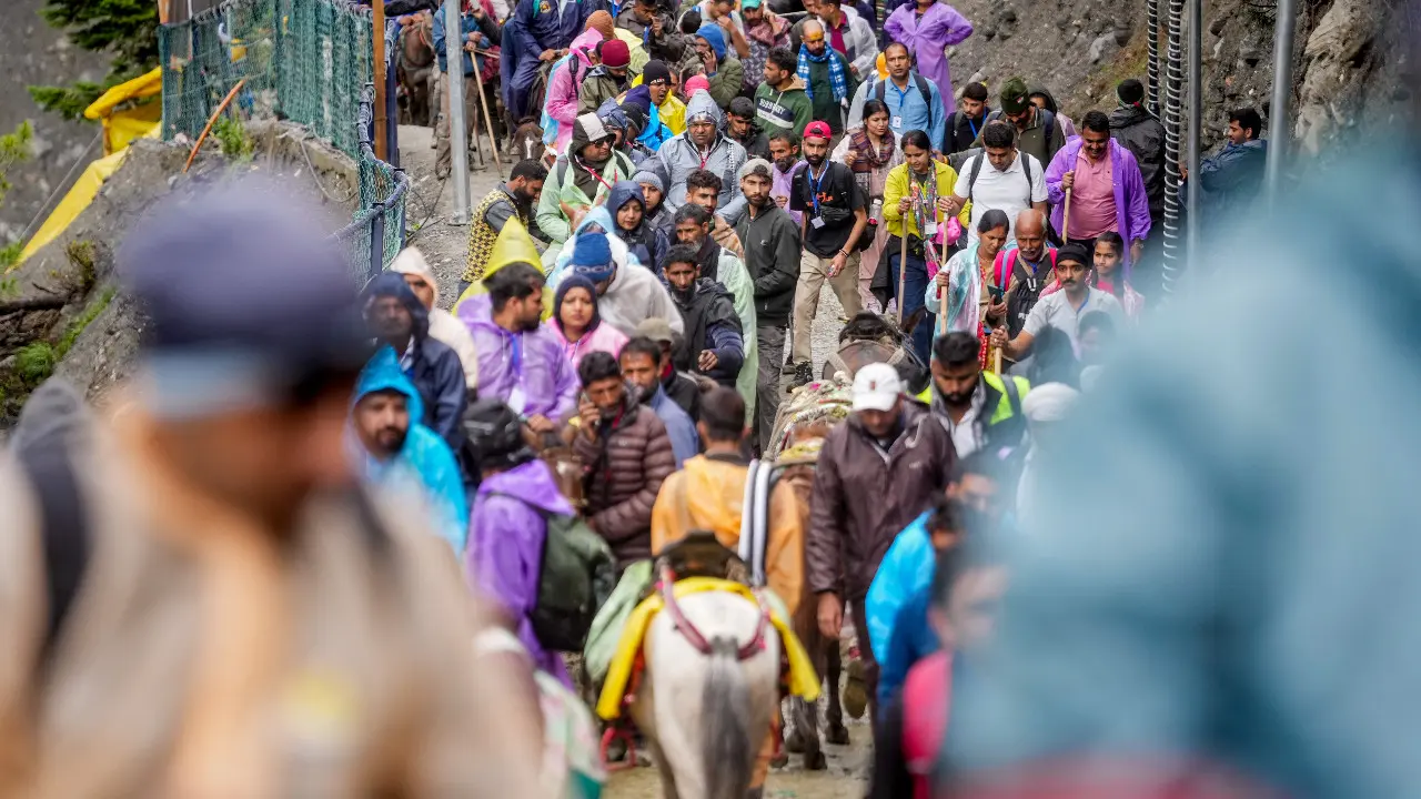 PICS: Annual Amarnath Yatra kick starts as first batches of pilgrims leave base Pilgrims set off from Baltal and Nunwan as the annual Amarnath Yatra begins, climbing toward the 3,880-metre high cave. Photo courtesy: PTI and AFP