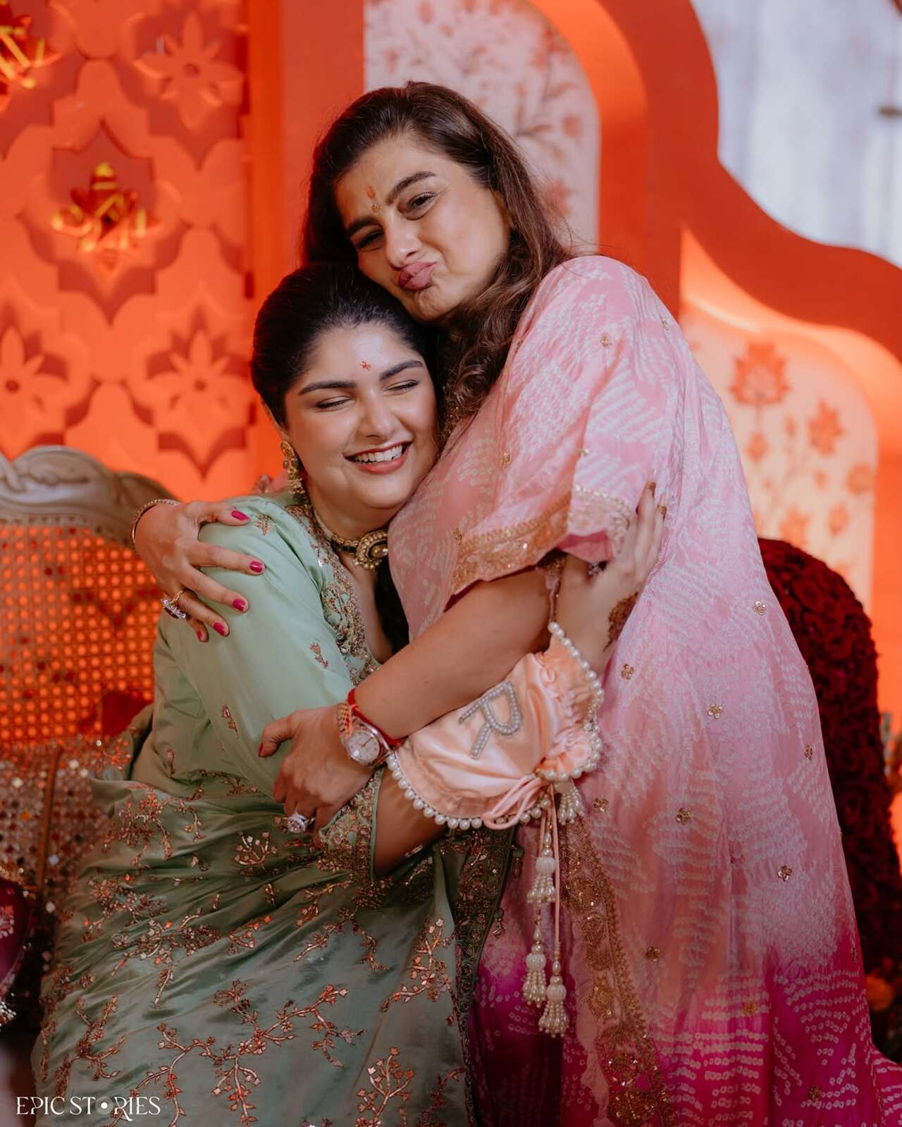 One emotional photograph captures Anshula embracing a loved one, with an emotional yet happy moment, reflecting the sentimental significance of the occasion