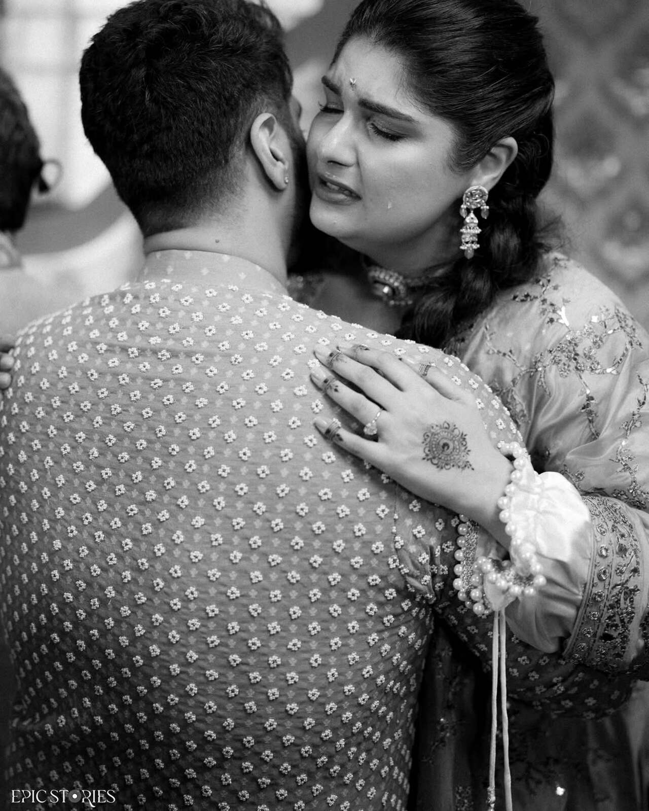 Emotional moments are also captured as Anshula shares a tight hug with brother Arjun Kapoor, smiling through tears during the intimate celebration