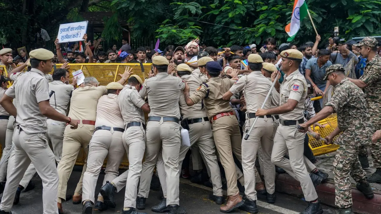 Heavy security in Delhi ahead of CJP's 'Chalo Sansad' march Security personnel stop Cockroach Janata Party (CJP) supporters as they raise slogans near Jantar Mantar ahead of a protest march, in New Delhi, Monday(PICS/PTI)