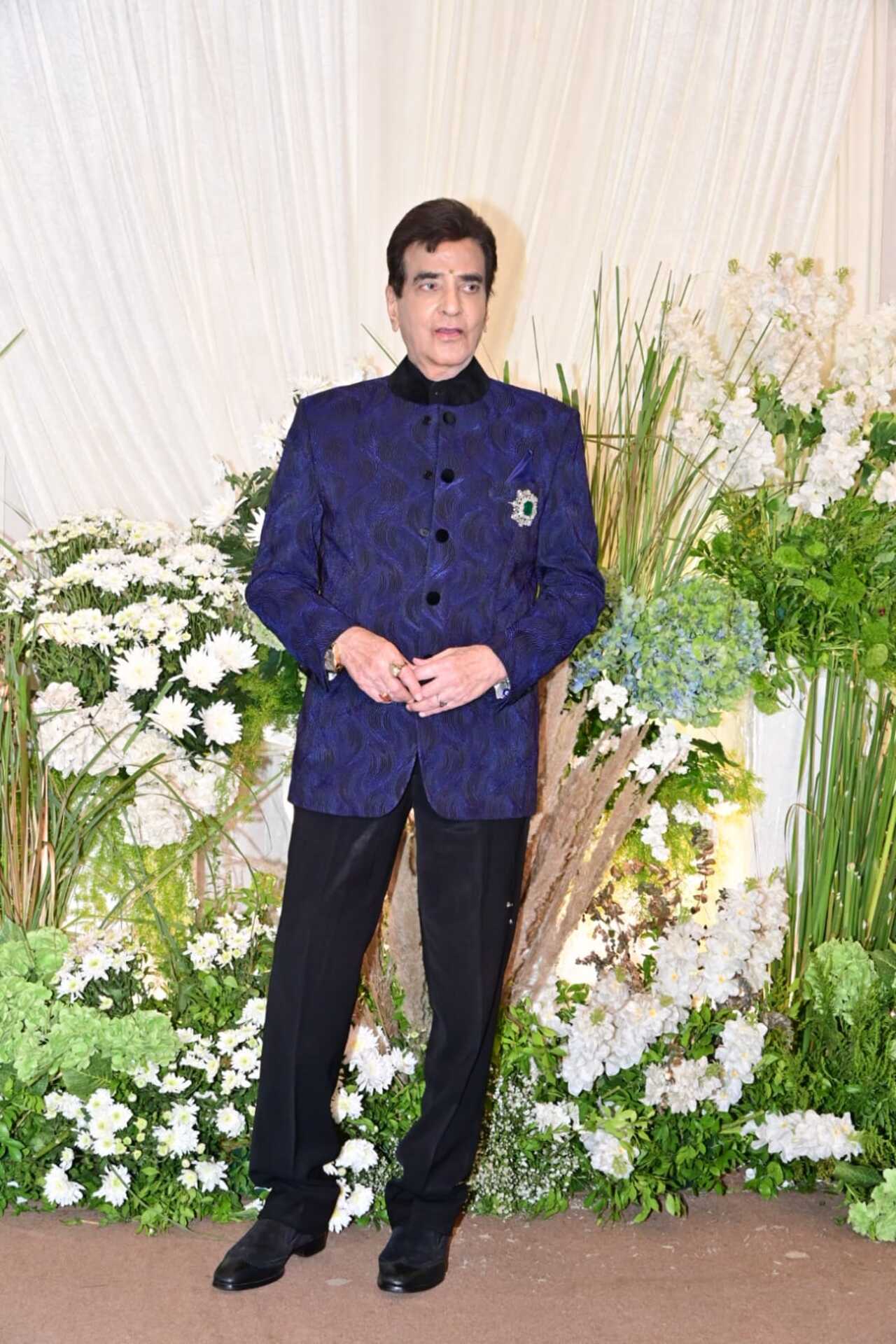 Jeetendra shines in the evergreen style with a navy blue bandhgala and black pants. His appearance at the wedding reception is equivalent to his blessings