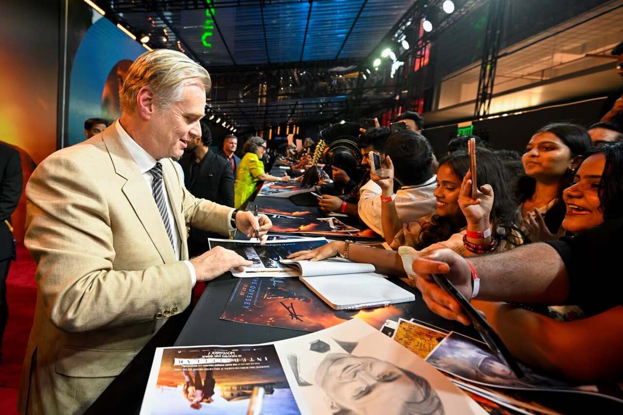 Fans and their love for The Odyssey cannot be justified in just one click. Christopher Nolan made sure his fans were happy with all those autographs Fans and their love for The Odyssey cannot be justified in just one click. Christopher Nolan made sure his fans were happy with all those autographs