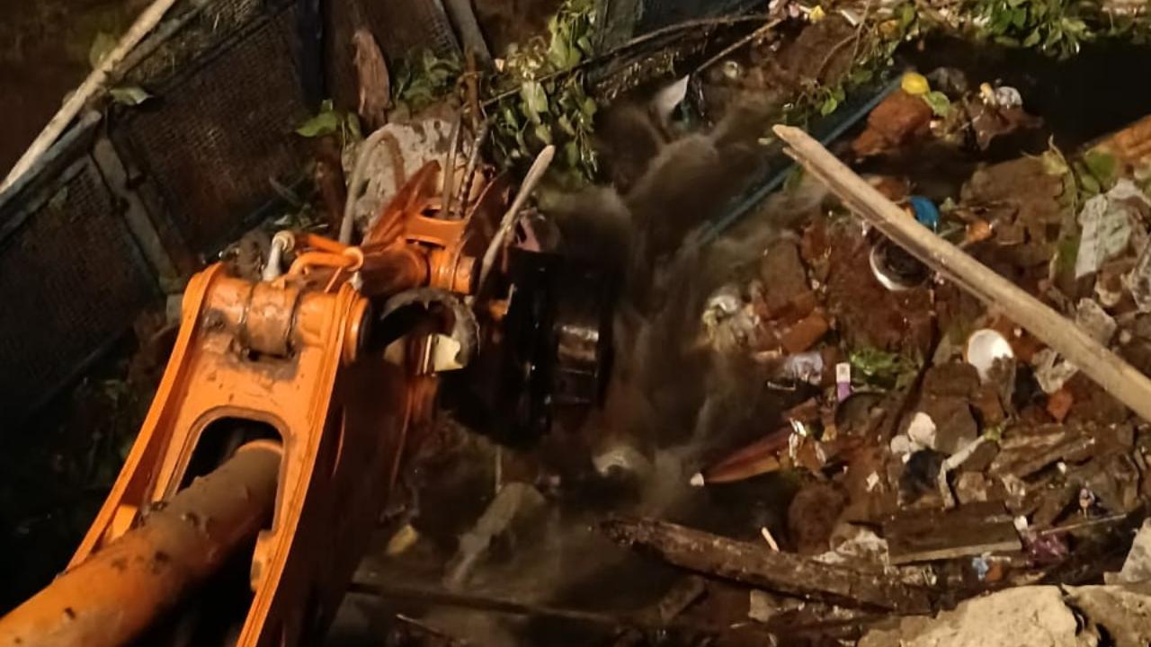 Officials said the situation is under control and further repair work will continue until the damaged section of the wall is fully cleared and the drain is made safe Officials said the situation is under control and further repair work will continue until the damaged section of the wall is fully cleared and the drain is made safe