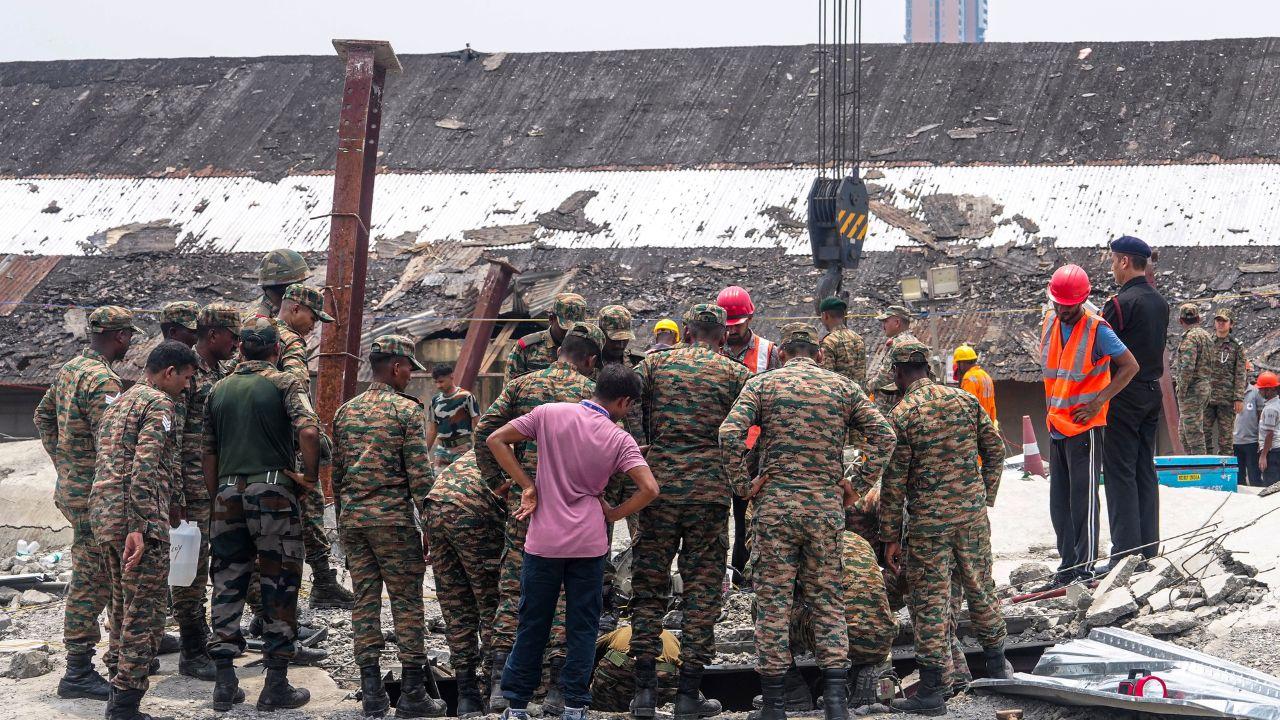 Nearly 40 workers were believed to be inside the warehouse when the roof collapsed, sparking an urgent search for survivors beneath the massive pile of debris