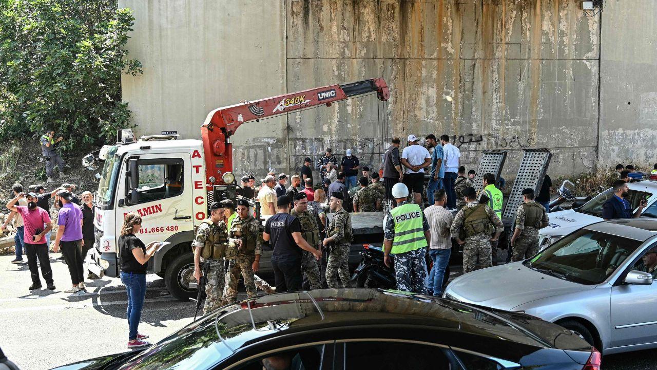 A tow truck removes the wreckage of the targeted vehicle from the highway, damged due to the ongoing conflict between Israel and Hezbollah A tow truck removes the wreckage of the targeted vehicle from the highway, damged due to the ongoing conflict between Israel and Hezbollah