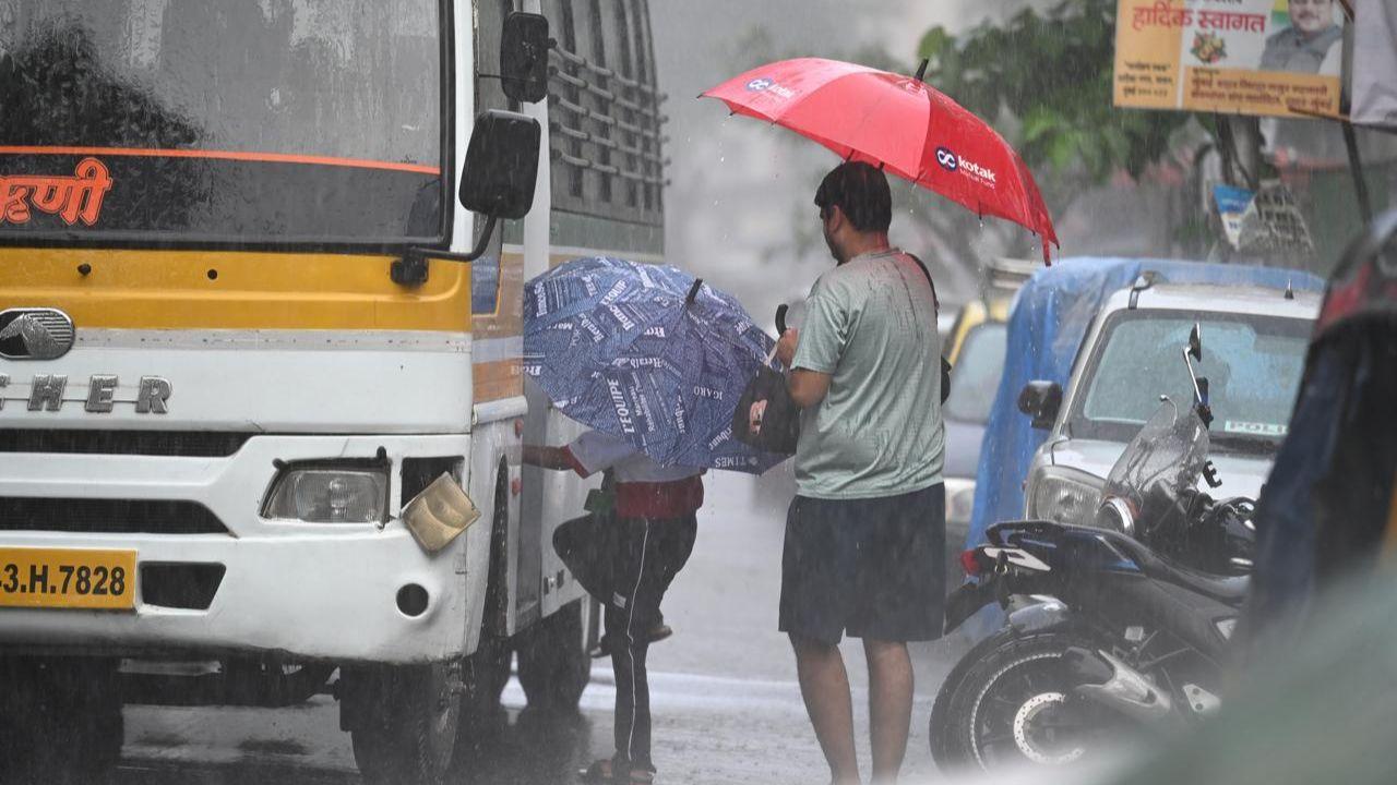 Mumbai's changing weather takes centre stage as a heavy burst of rain blankets the Sion-Wadala stretch during the afternoon rush