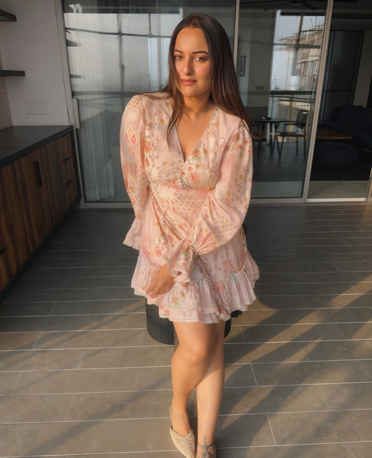 Sonakshi keeps it fresh and feminine in a pastel floral mini dress. The soft colours, flowy sleeves, and delicate prints give the outfit a breezy charm. Sonakshi keeps it fresh and feminine in a pastel floral mini dress. The soft colours, flowy sleeves, and delicate prints give the outfit a breezy charm.