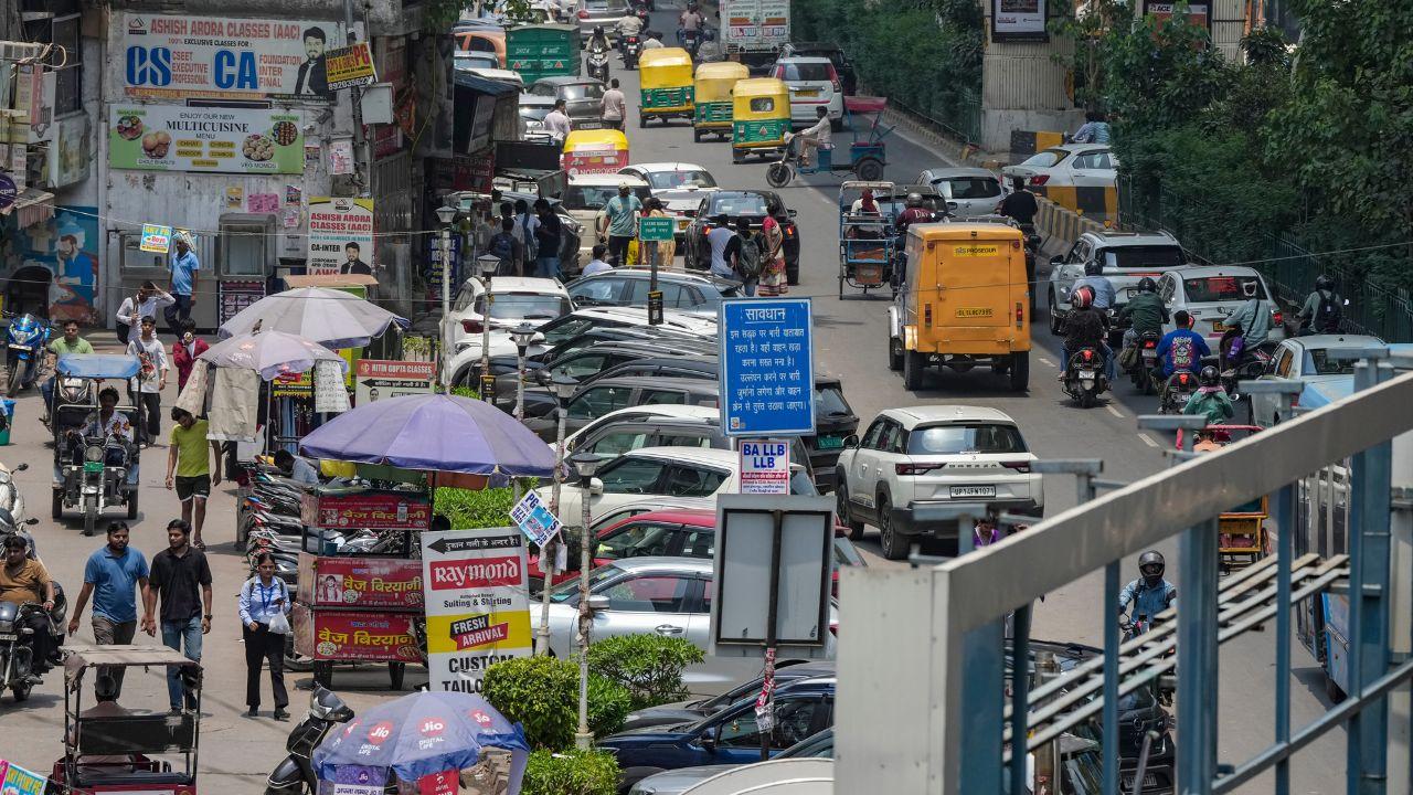 In Shaheen Bagh and Laxmi Nagar, footpaths are occupied by parked vehicles, roadside vendors and commercial encroachments, pushing pedestrians into fast-moving traffic In Shaheen Bagh and Laxmi Nagar, footpaths are occupied by parked vehicles, roadside vendors and commercial encroachments, pushing pedestrians into fast-moving traffic