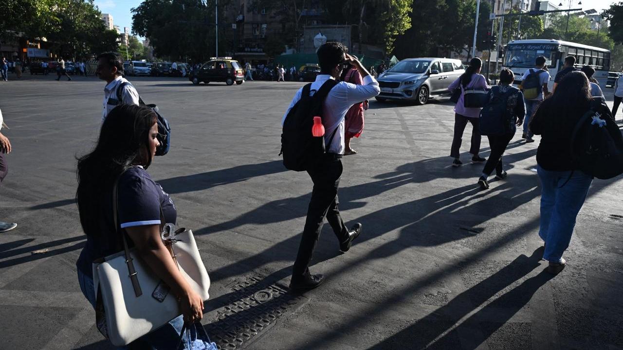 Several commuters were seen walking considerable distances to reach stations, while others relied on taxis where available