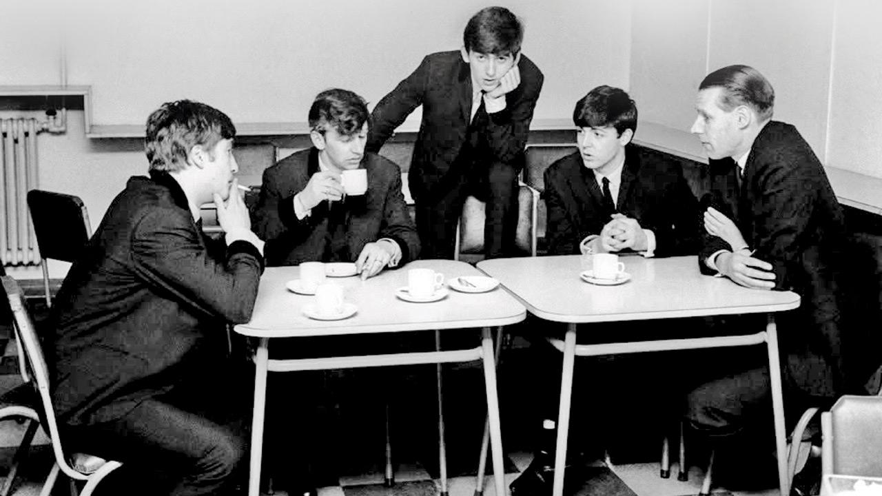Eat like The Beatles by indulging in these delicious dishes across Mumbai A dated photograph of The Beatles at the table with manager George Martin (extreme right). PICs COURTESY/THE BEATLES ON FACEBOOK