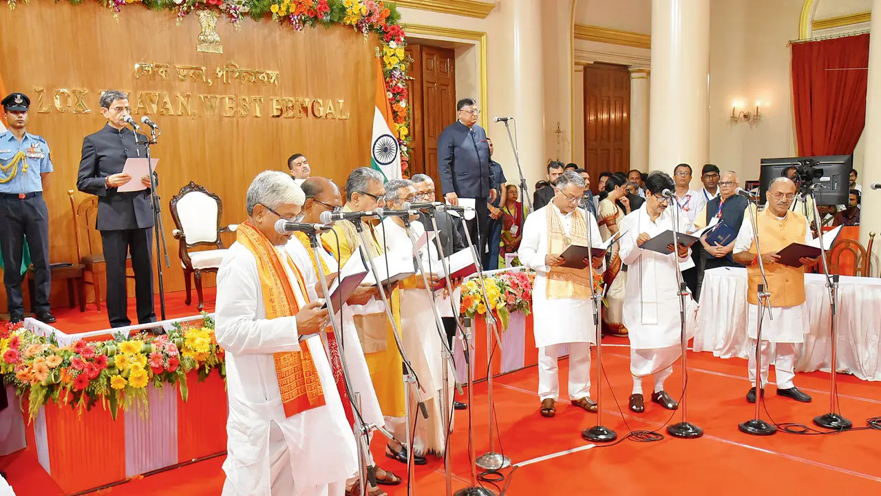 West Bengal BJP government expands cabinet, 35 MLAs take oath as ministers Members take oath during a swearing-in ceremony at Lok Bhavan, in Kolkata on Monday. PIC/X/@lokbhavan_wb