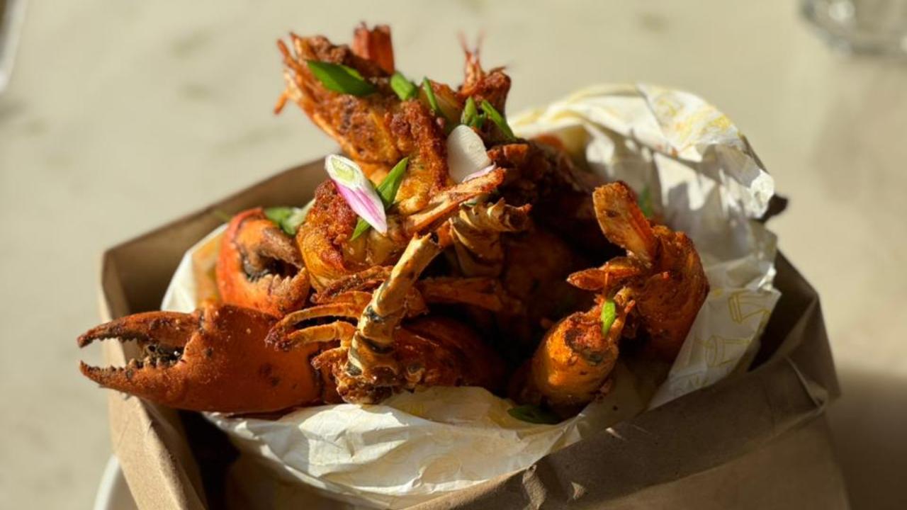 Seafood specialLe Caf&eacute; is bringing the flavours of Ireland to Mumbai with the launch of its limited-edition menu called 'Lobster Spice Bag'. Inspired by Ireland's iconic late-night street food favourite and reimagined with Le Caf&eacute;'s signature flair, the indulgent special combines premium shellfish with bold spices, in one flavour-packed feast.
At the heart of the dish is a generous mix of lobster, crab, scampi, and tiger prawns, Cajun-spiced, golden-fried, and tossed in Le Caf&eacute;'s house spice blend.&nbsp;
Served alongside crispy fries, prawn crackers, golden corn, trio bell peppers, and Thai chilli, the dish is finished with herb butter, Italian lime, and an in-house sauce that ties every flavour together beautifully.
Diners can pair the Lobster Spice Bag with an exclusive beer offer and unwind this June.
Where: Le Caf&eacute;, Jewel of Chembur, ChemburWhen: June 5 onwardsTime: 10 am to 11:30 pmPrice: The Lobster Spice Bag at Rs 3,999 plus taxes; beer(Selected brand) - Buy 4 bottles for Rs 1,155 plus taxes (regular price is Rs 1,540)Call: 022 6709 9977 for details