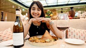 Anushka Malkani, chef and founder of the Bombay Wine Club, introduces us to a surprisingly delightful pairing of Beaujolais, a French red, with crisp, buttery dosa. Pic/Atul Kamble; Location Courtesy Filia, at Roswyn 