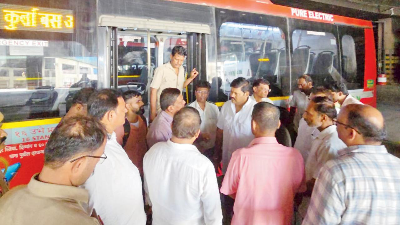 Mumbai: BEST committee flags safety concerns over electric bus fleet Officials and staff inspect facilities at the Kurla West bus depot during a visit that raised concerns over electric bus operations, brake pressure checks, and charging infrastructure. Pics/By Special Arrangement