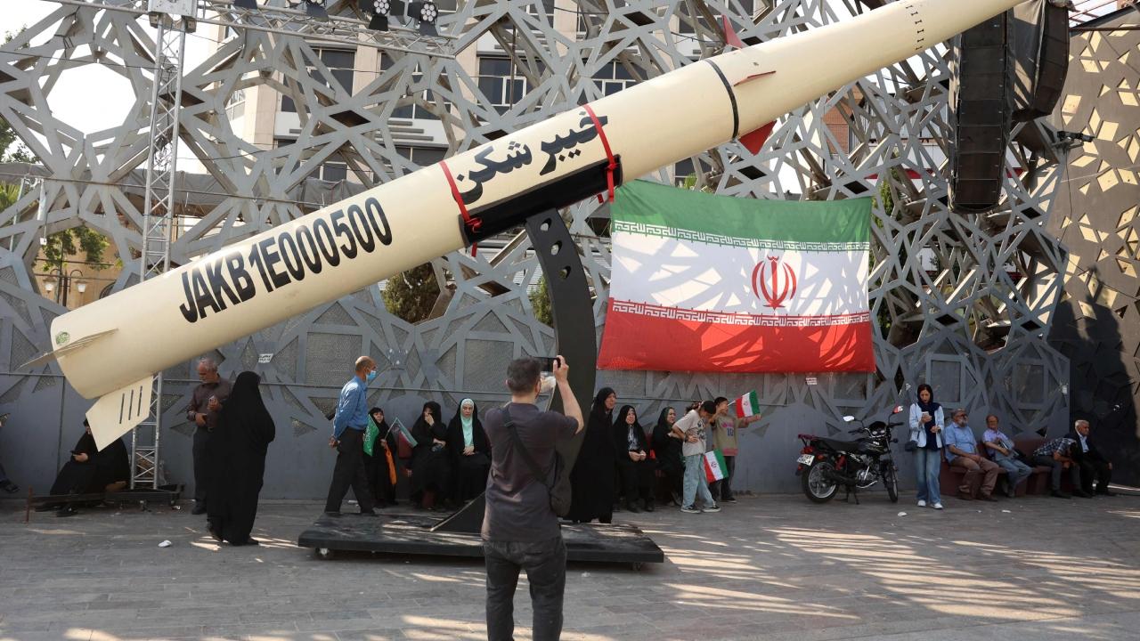 An Iranian missile was on display in the middle of the road, with locals gathering around it to be photographed