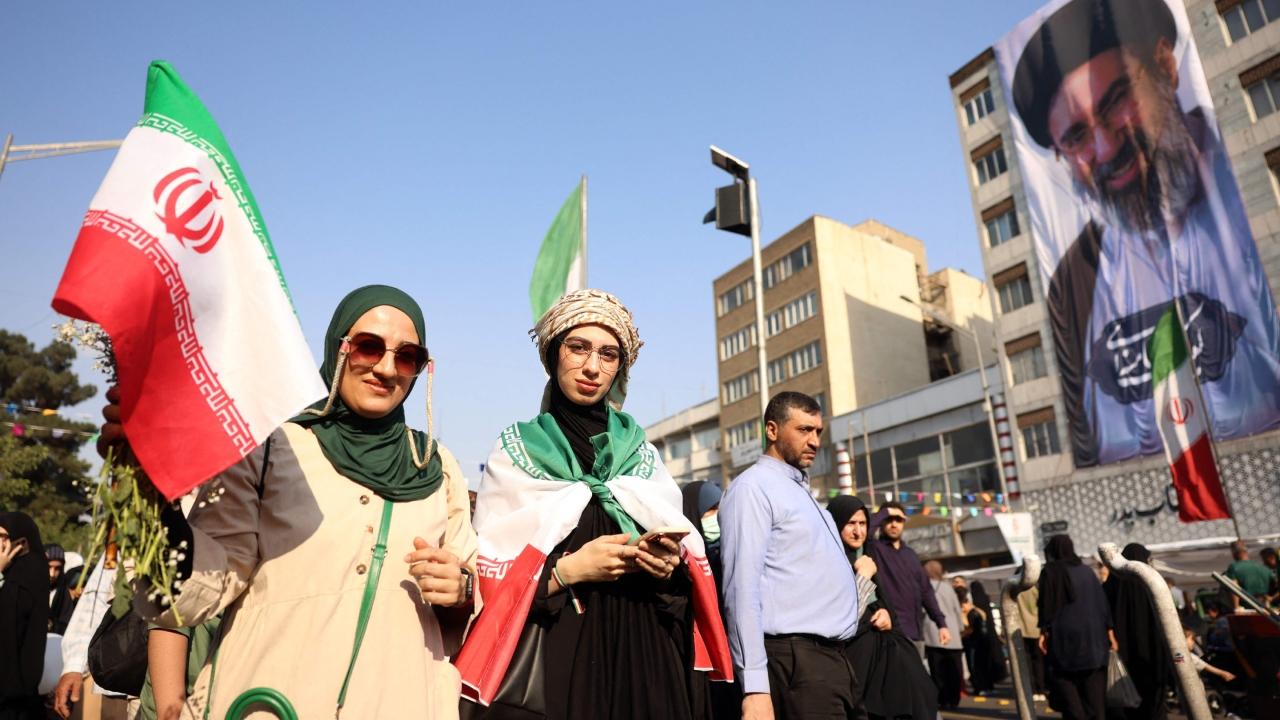 The streets of Tehran, festooned with brightly coloured balloons and flags of the Islamic republic and full of revellers stretching kilometres into the distance, offered a stark contrast to the tense diplomatic sphere