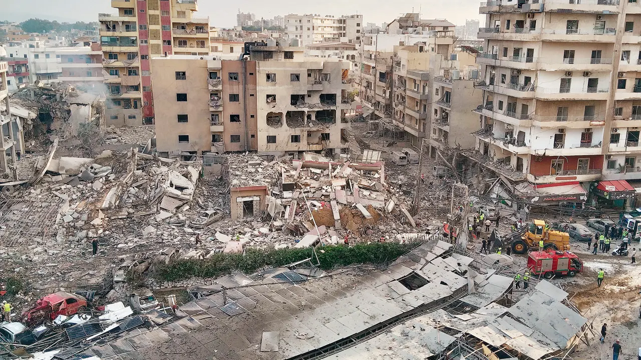 Rescuers work at the site of an Israeli airstrike in Tyre, Lebanon, on Monday. PIC/AP/PTI