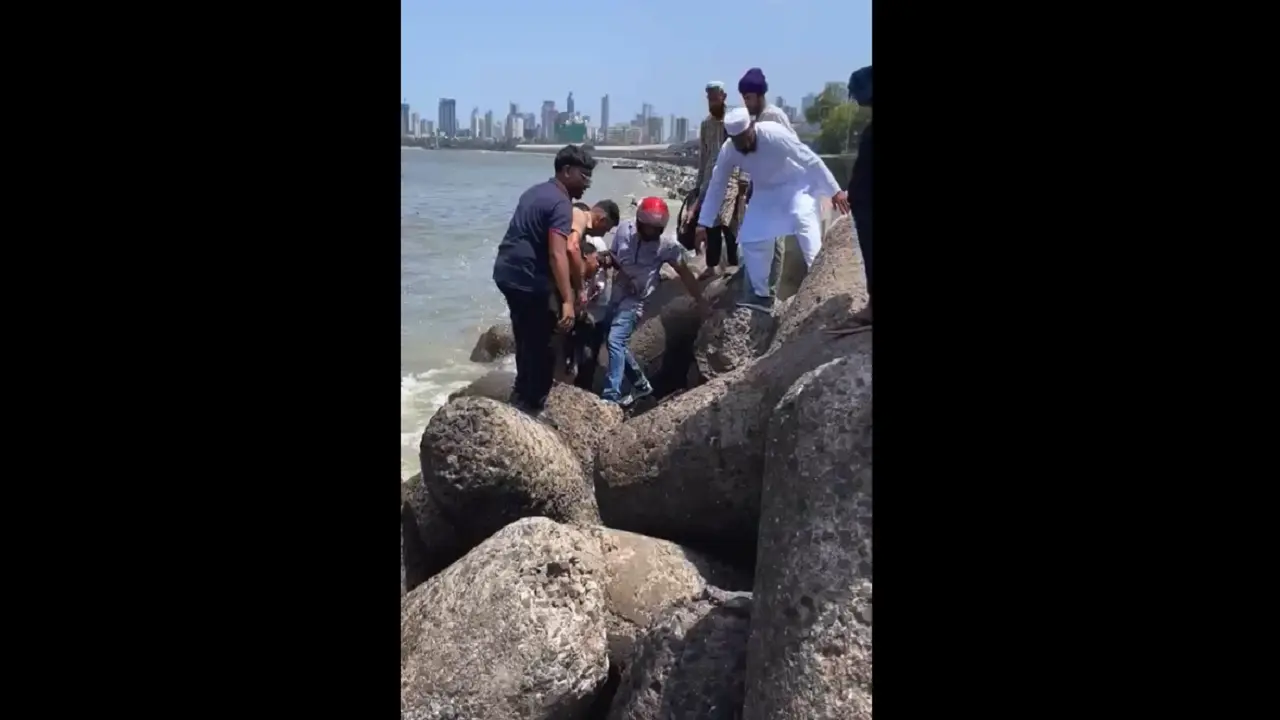 Watch: Quick action by Mumbai cop and bystanders saves woman at Marine Drive Screengrab