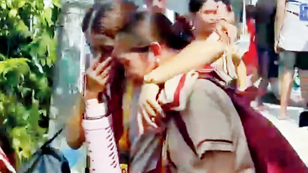 Philippines school shooting kills three students, two minors arrested Students react after the shooting incident. PIC/AFP