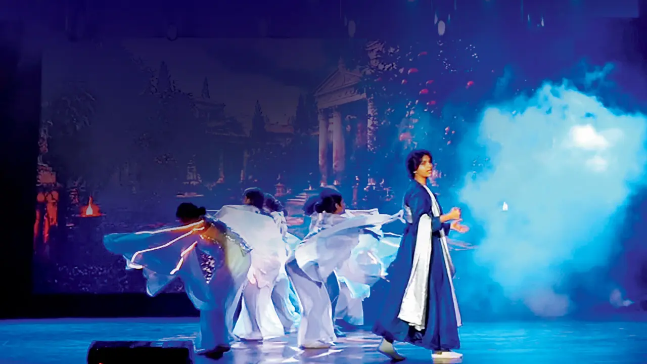 Children perform during a musical interlude in the rehearsal