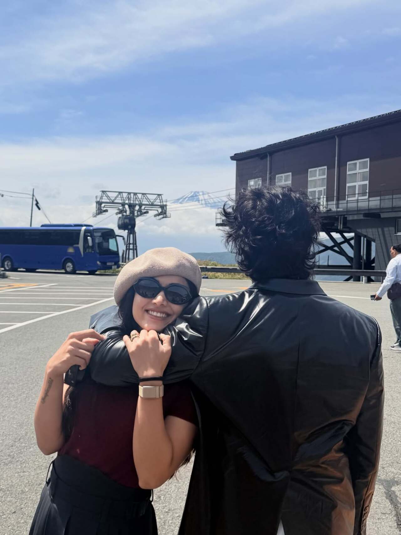 Among the most talked-about moments was a candid picture featuring Vijay, where Rashmika is seen affectionately holding onto him as they enjoy a picturesque outdoor location with Mount Fuji visible in the backdrop.