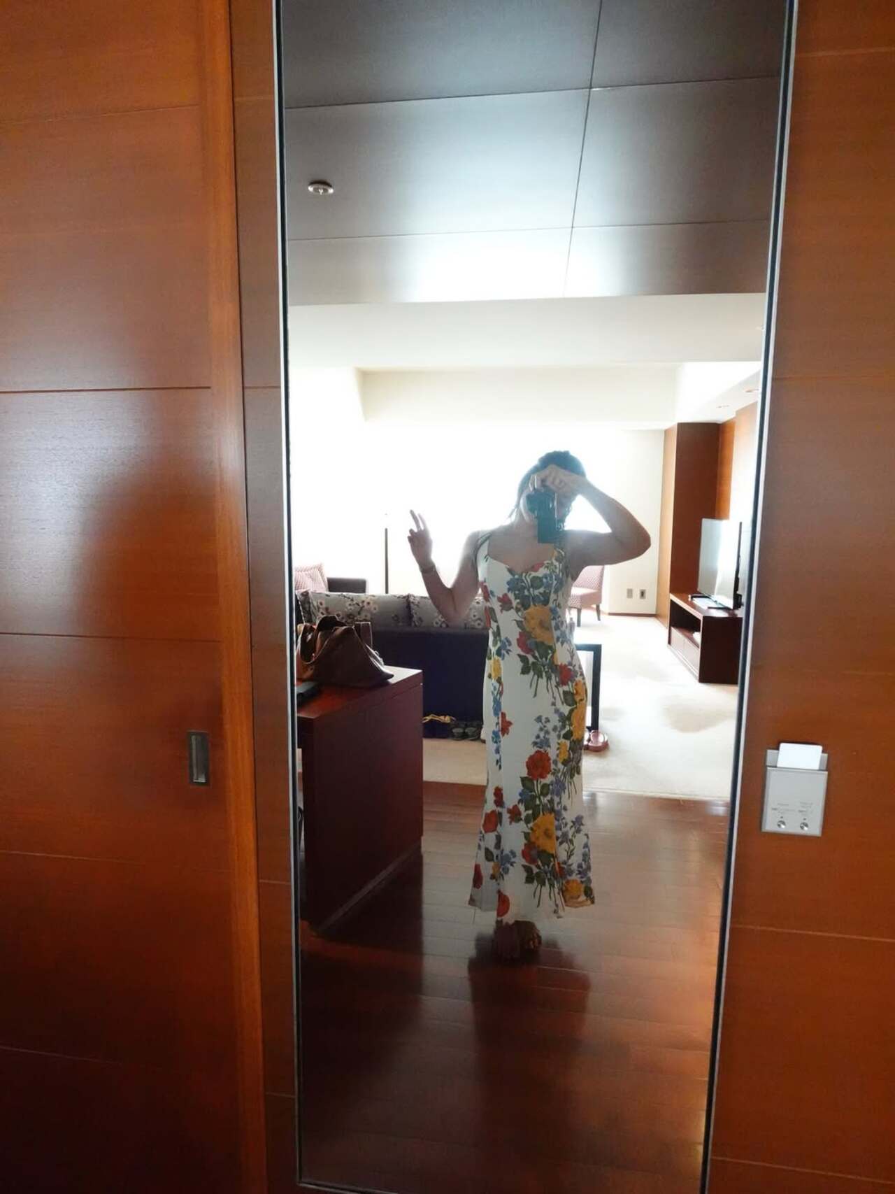 Another mirror selfie captures the actress in a breezy floral dress as she enjoys her stay in Japan.