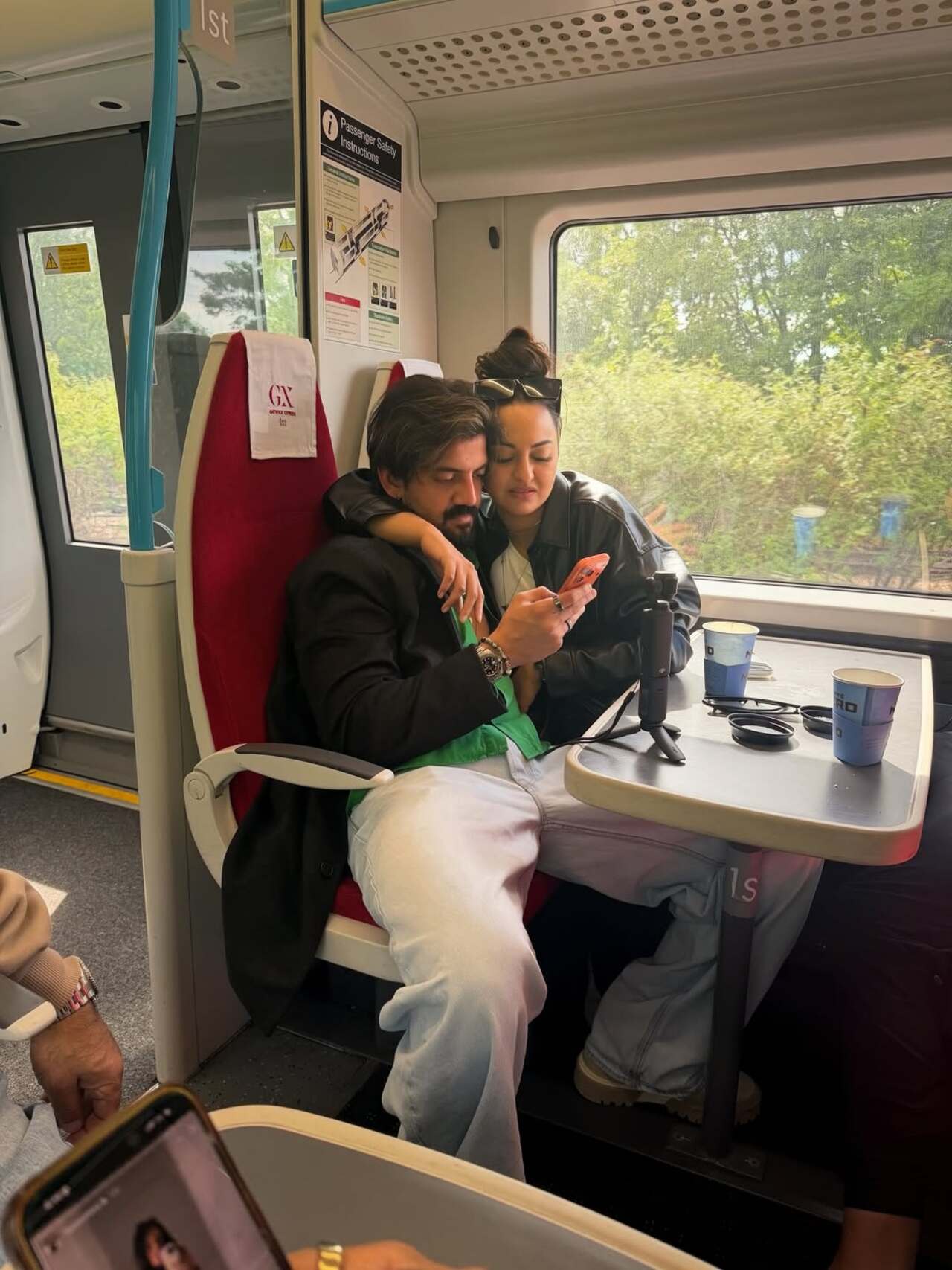 In a cozy train moment, Sonakshi and Zaheer Iqbal were seen sharing a quiet and intimate journey together. In a cozy train moment, Sonakshi and Zaheer Iqbal were seen sharing a quiet and intimate journey together.