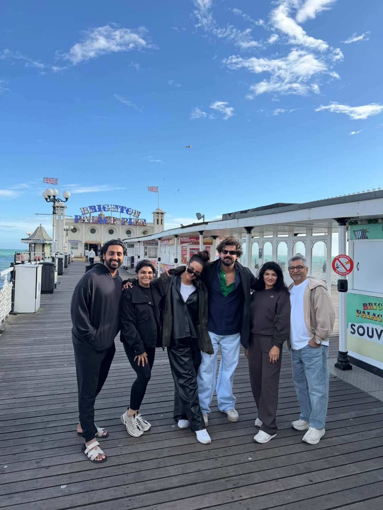 The birthday celebrations began on a cheerful note as the group posed together on the iconic Brighton Palace Pier in the UK. The birthday celebrations began on a cheerful note as the group posed together on the iconic Brighton Palace Pier in the UK.