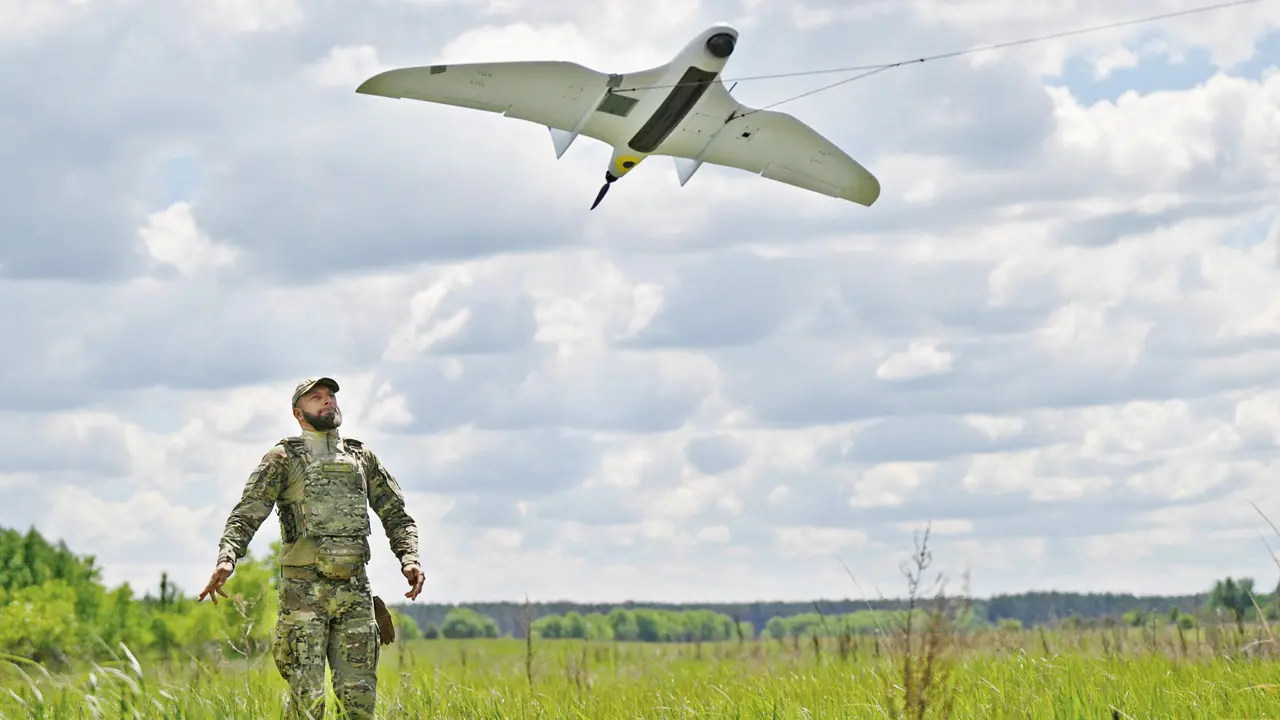 A Ukrainian serviceman launches a UAV for a patrol flight. PIC/AFP