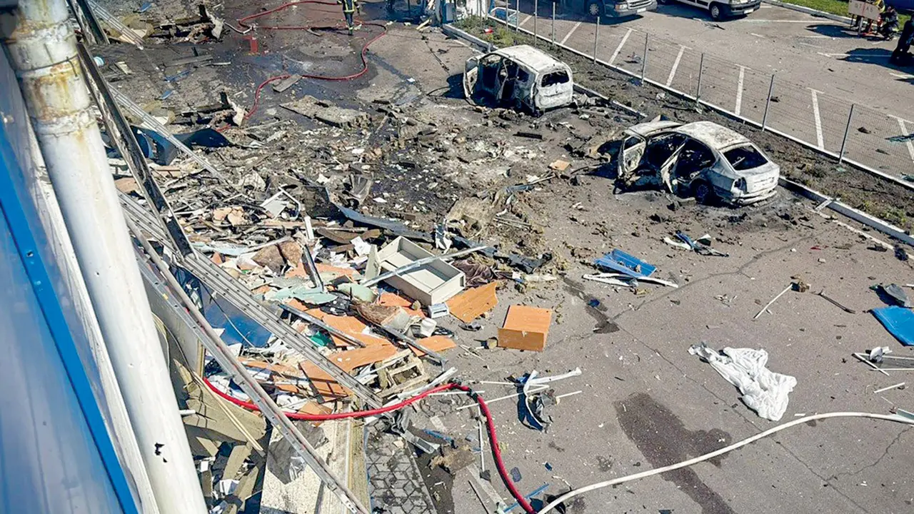 Ukrainian rescuers work at the site of a Russian air attack in the Kyiv region, on Friday. PIC/AFP