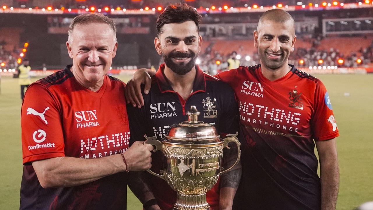 Following the triumph, Kohli also shared the frame with RCB's Director of Cricket (Doc) Mo Bobat and head coach Andy Flower at the iconic venue in Ahmedabad (Pic: PTI)