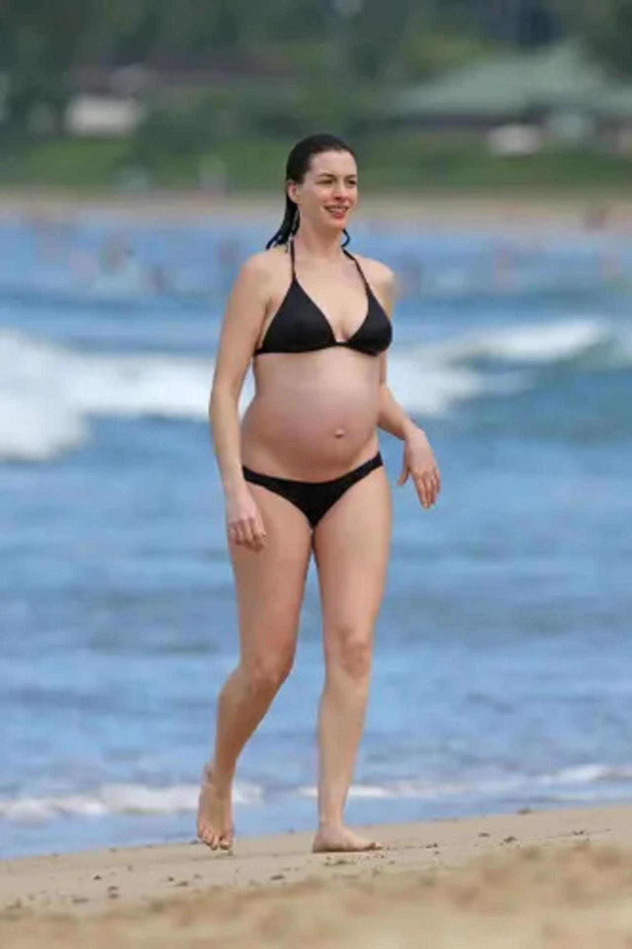 Announcing her third pregnancy, Hathaway shared a video of herself, cutely revealing her baby bump before she moves away giggling. "x Baby, I'm yours x," she wrote in the caption.