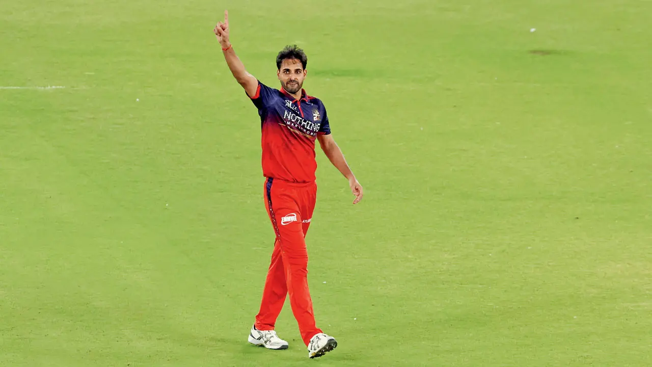 IPL 2026 | 'He has been outstanding for us...': Andy Flower on Bhuvneshwar Kumar RCB pacer Bhuvneshwar Kumar celebrates the wicket of GT opener Sai Sudharsan during the IPL final in Ahmedabad on Sunday. Pic/IPL