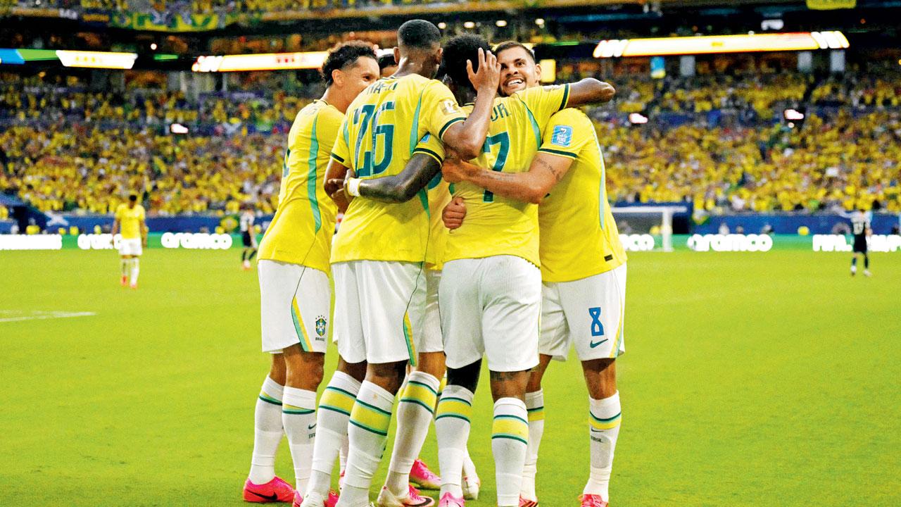 Brazil players celebrate a goal vs Scotland recently. Pic/AFP